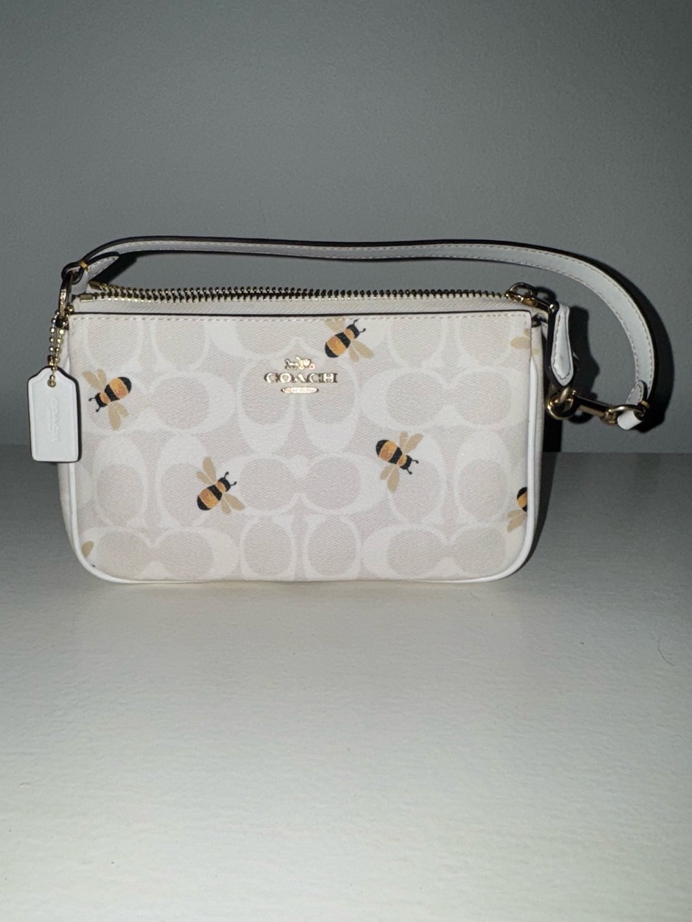 Coach Mini Wristlet in Cream with Bee Print